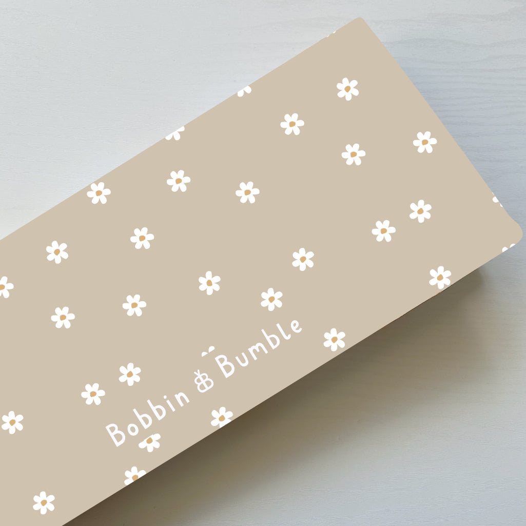 Folding Baby Changing Mat - Neutral Daisy | Bobbin and Bumble.