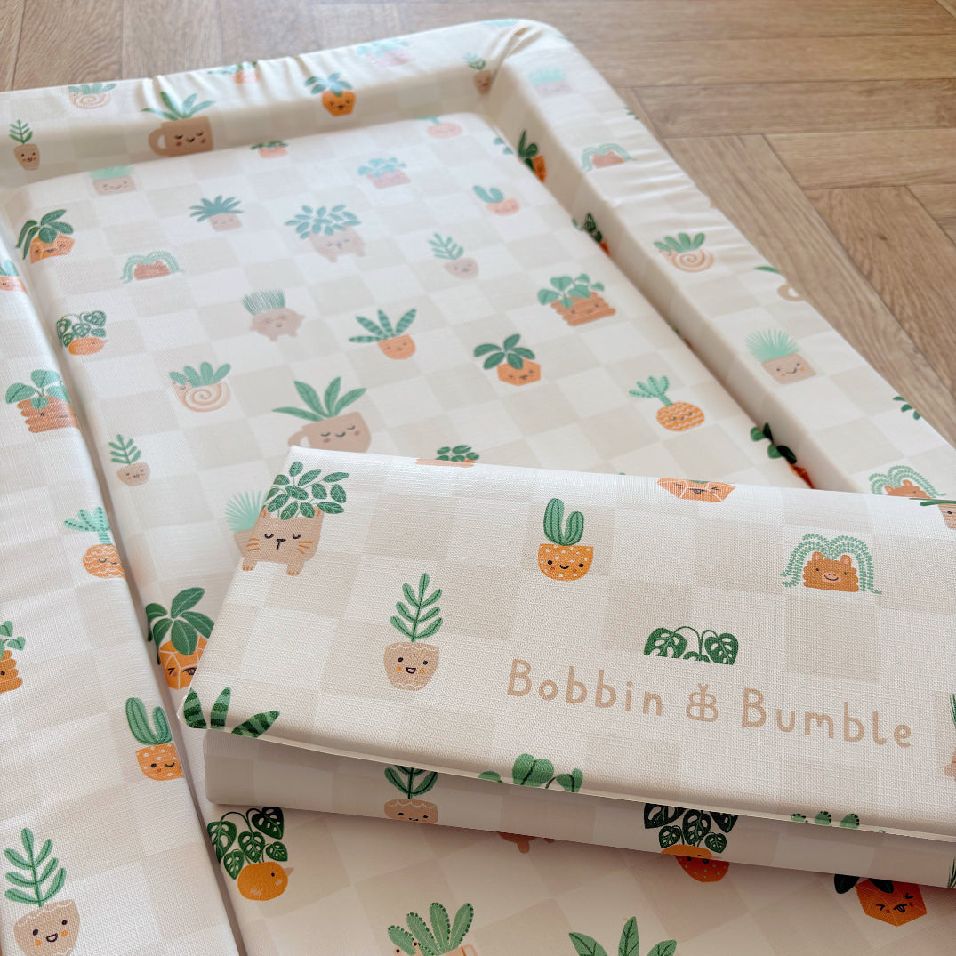 Baby changing pad with plant pattern design
