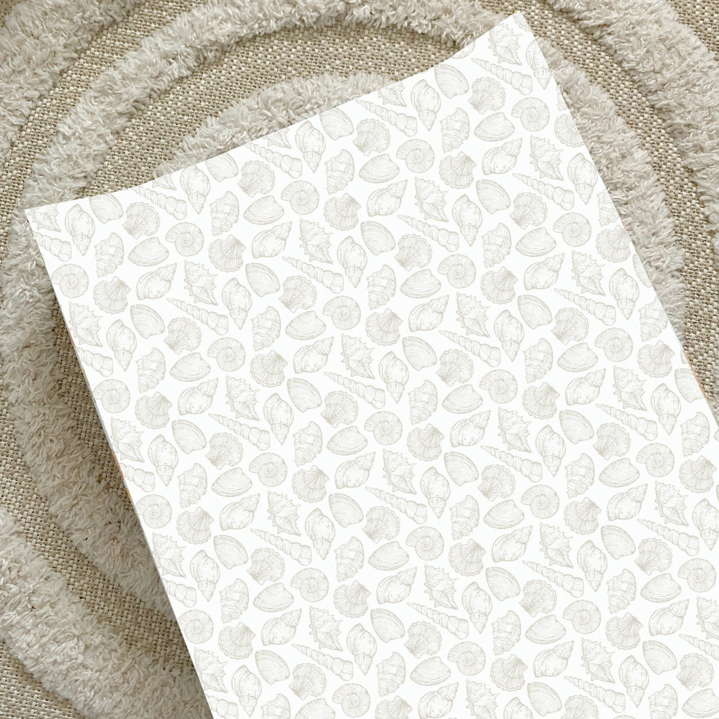 Anti-Roll Wedge Changing Mat - Delicate seashell print | Bobbin and Bumble.