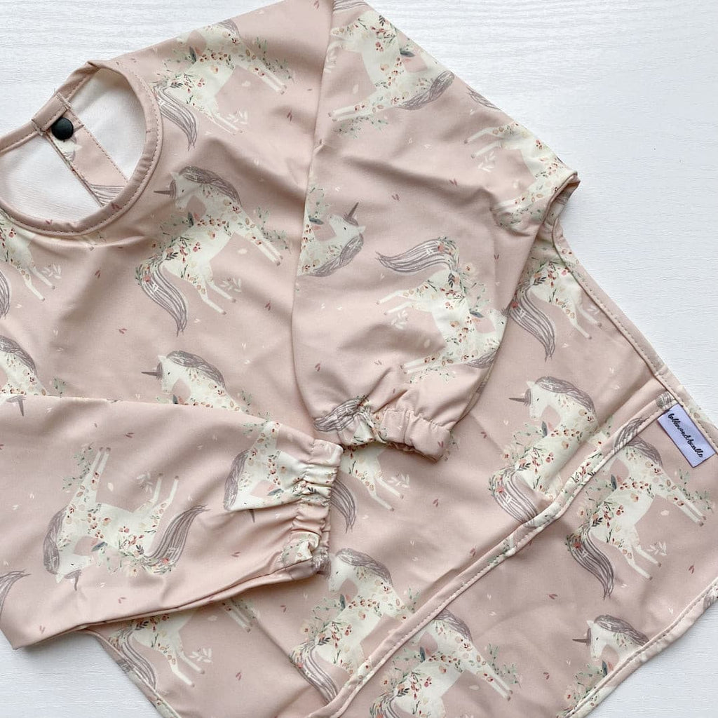 Long Sleeved Baby Bib - Pink Unicorn Print | Bobbin and Bumble.