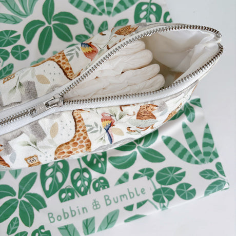 Jungle Animals nappy zip wallet half open with some nappies inside