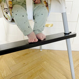 Black IKEA highchair footrest