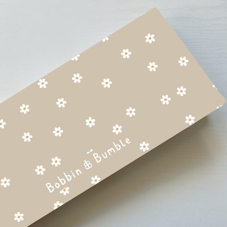 Folding Baby Changing Mat - Neutral Daisy | Bobbin and Bumble.