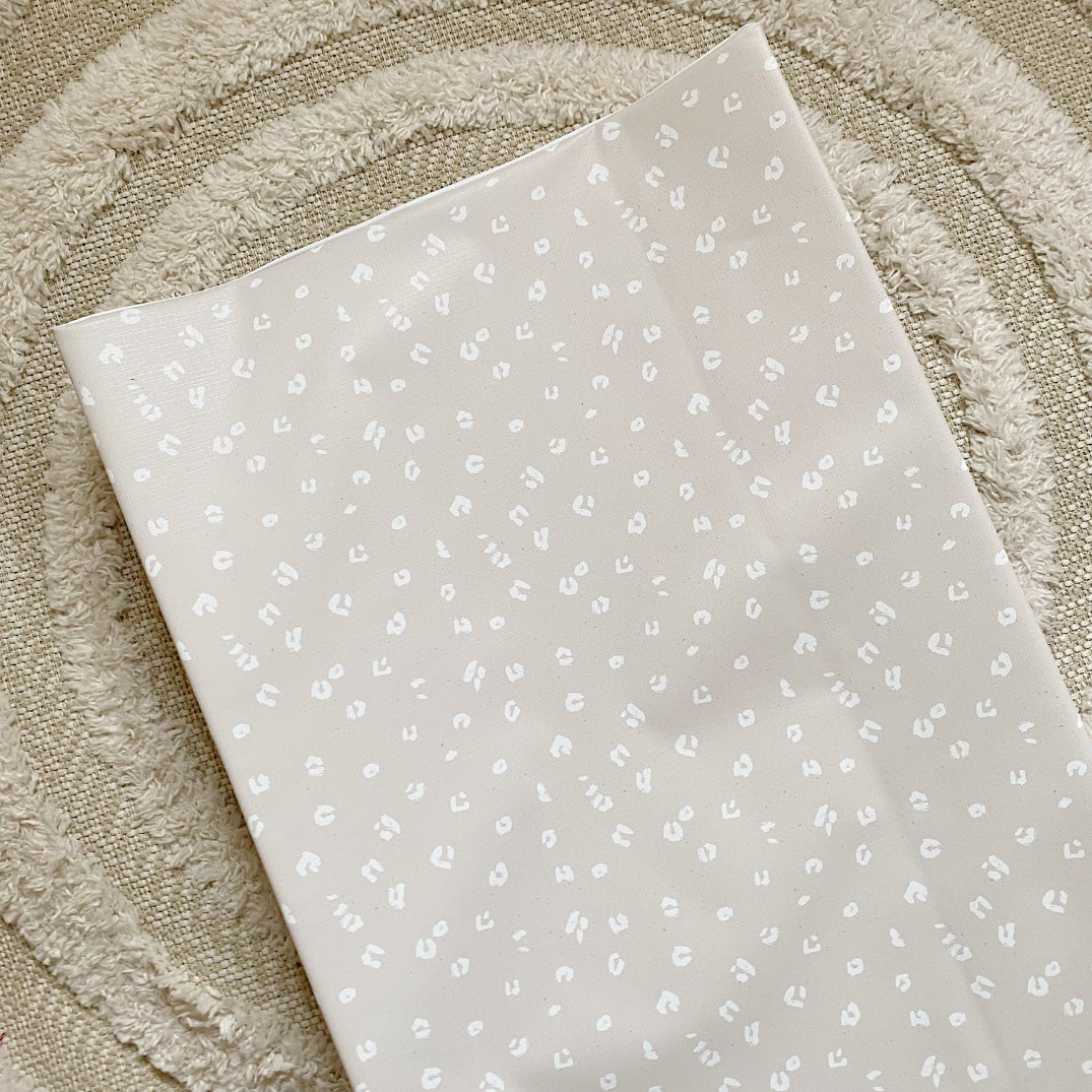 Anti-Roll Wedge Baby Changing Mat - Sand Animal Print | Bobbin and Bumble.