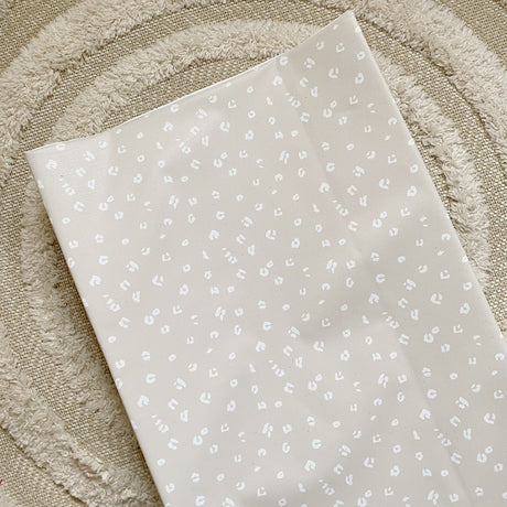 Anti-Roll Wedge Baby Changing Mat - Sand Animal Print | Bobbin and Bumble.