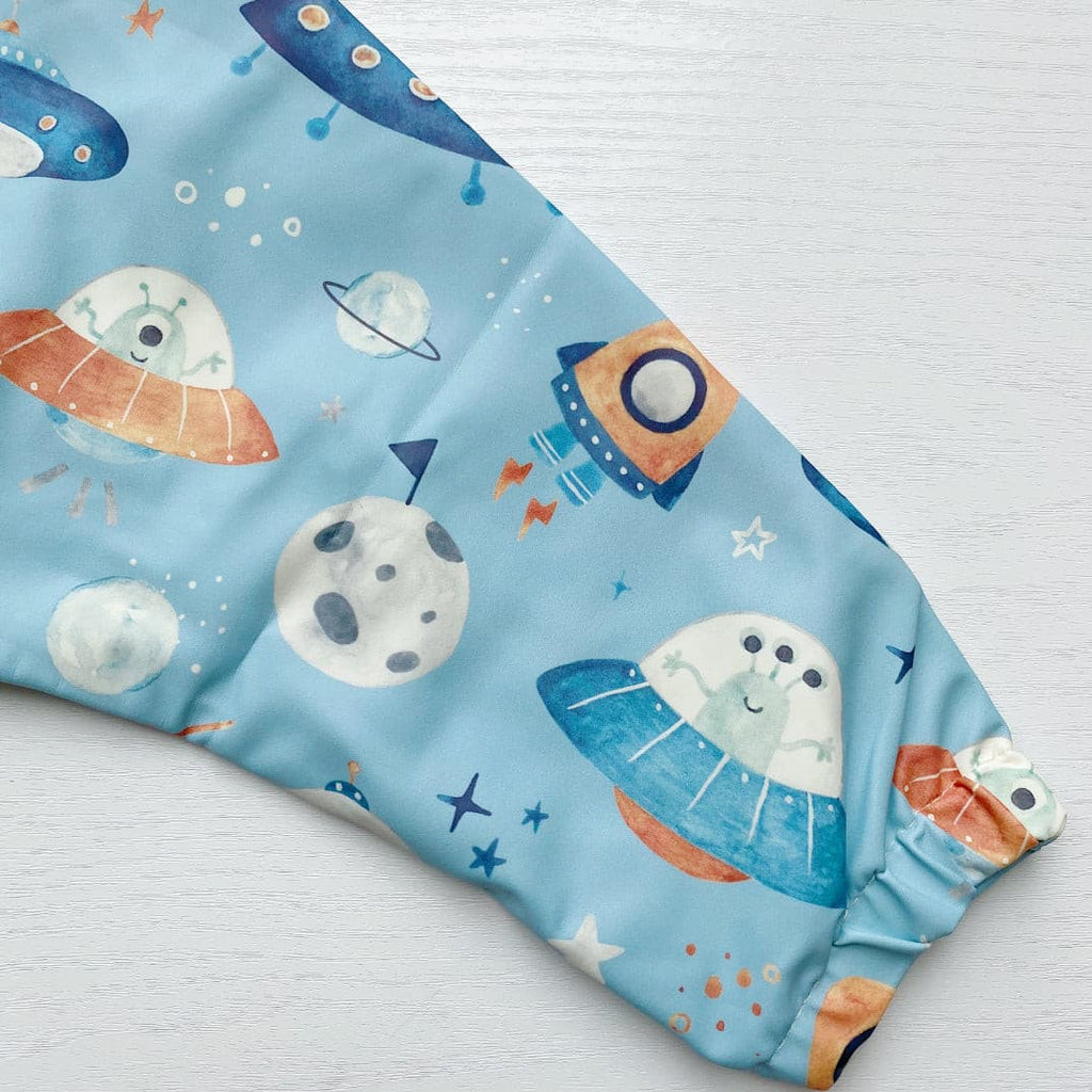 Long Sleeved Baby Bib - Space Ship Print | Bobbin and Bumble.