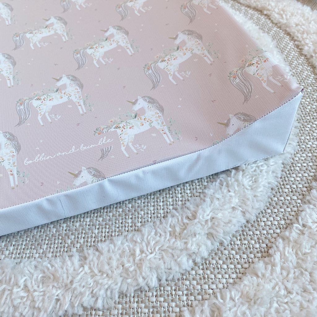 Anti-Roll Wedge Changing Mat - Pink Floral Unicorns Print | Bobbin and Bumble.