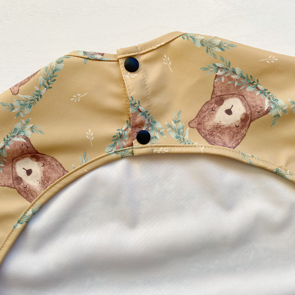 Long Sleeved Baby Bib - Mustard Brown Bear | Bobbin and Bumble.
