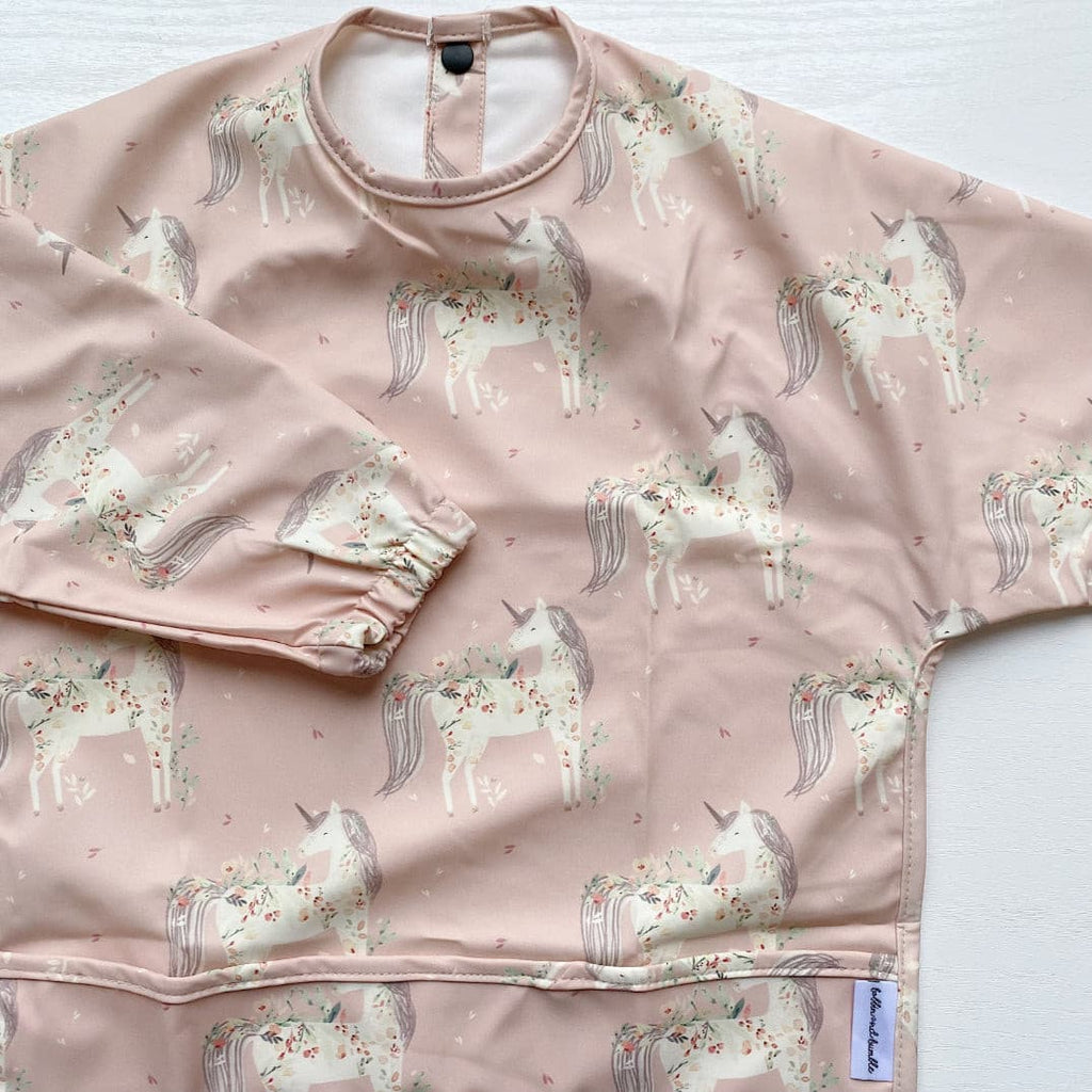 Long Sleeved Baby Bib - Pink Unicorn Print | Bobbin and Bumble.