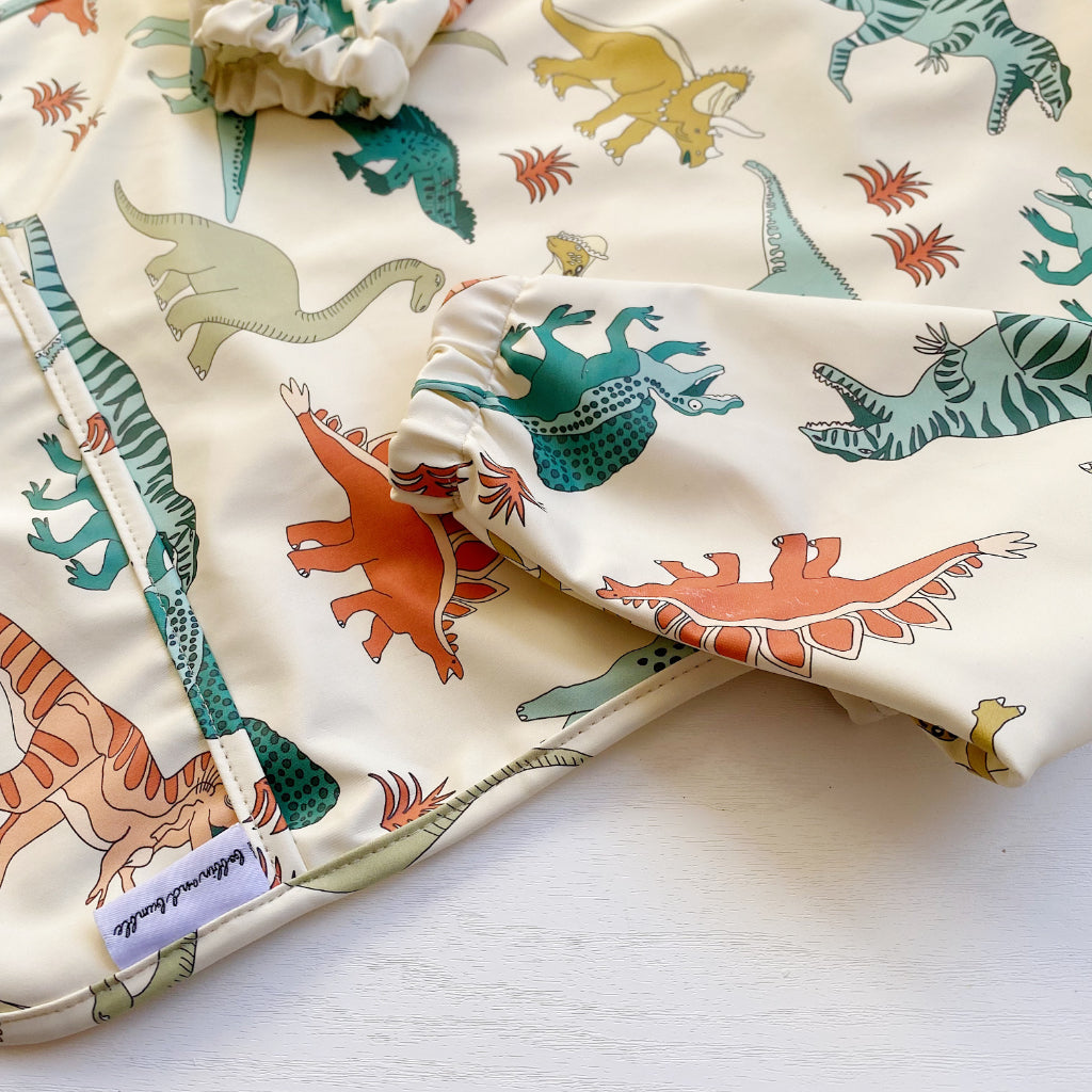 Long Sleeved Baby Bib - Dinosaur print | Bobbin and Bumble.