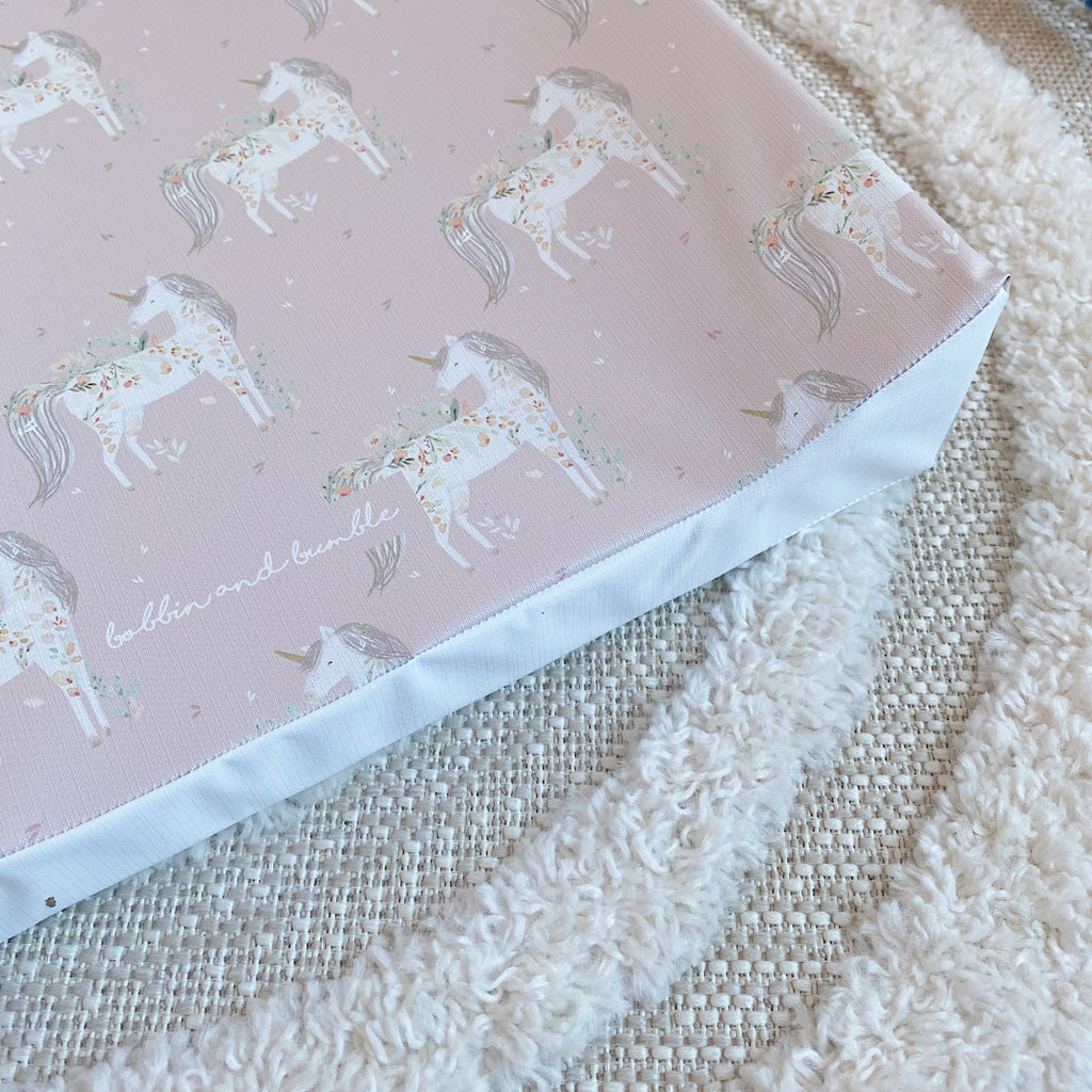 Anti-Roll Wedge Changing Mat - Pink Floral Unicorns Print | Bobbin and Bumble.