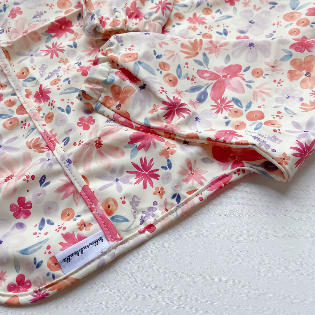 Long Sleeved Baby Bib - Pink Floral Print | Bobbin and Bumble.