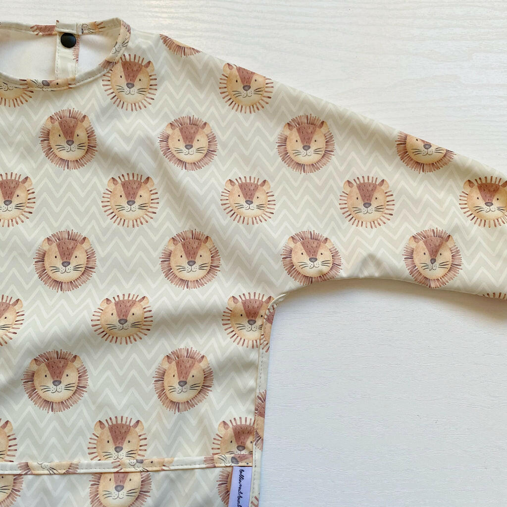 Long Sleeved Baby Bib - Leo Lion | Bobbin and Bumble.