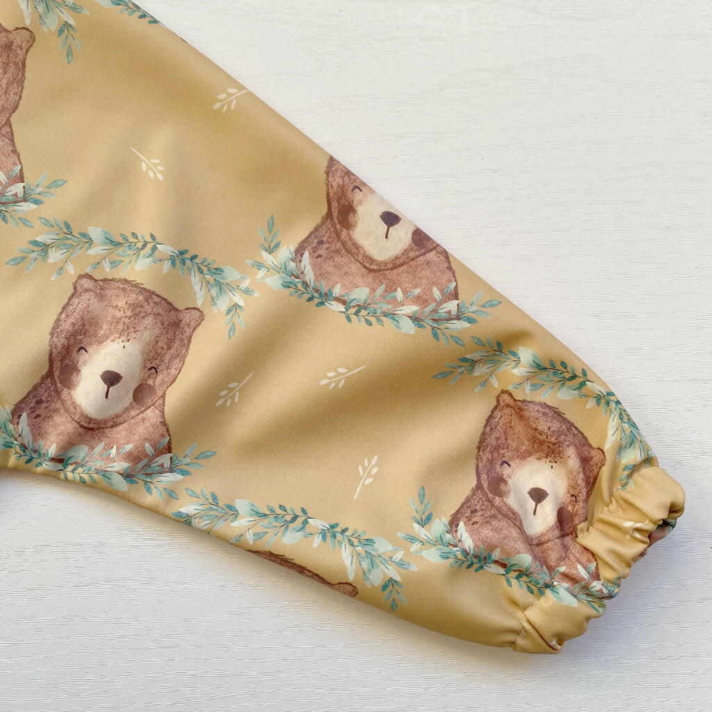 Long Sleeved Baby Bib - Mustard Brown Bear | Bobbin and Bumble.