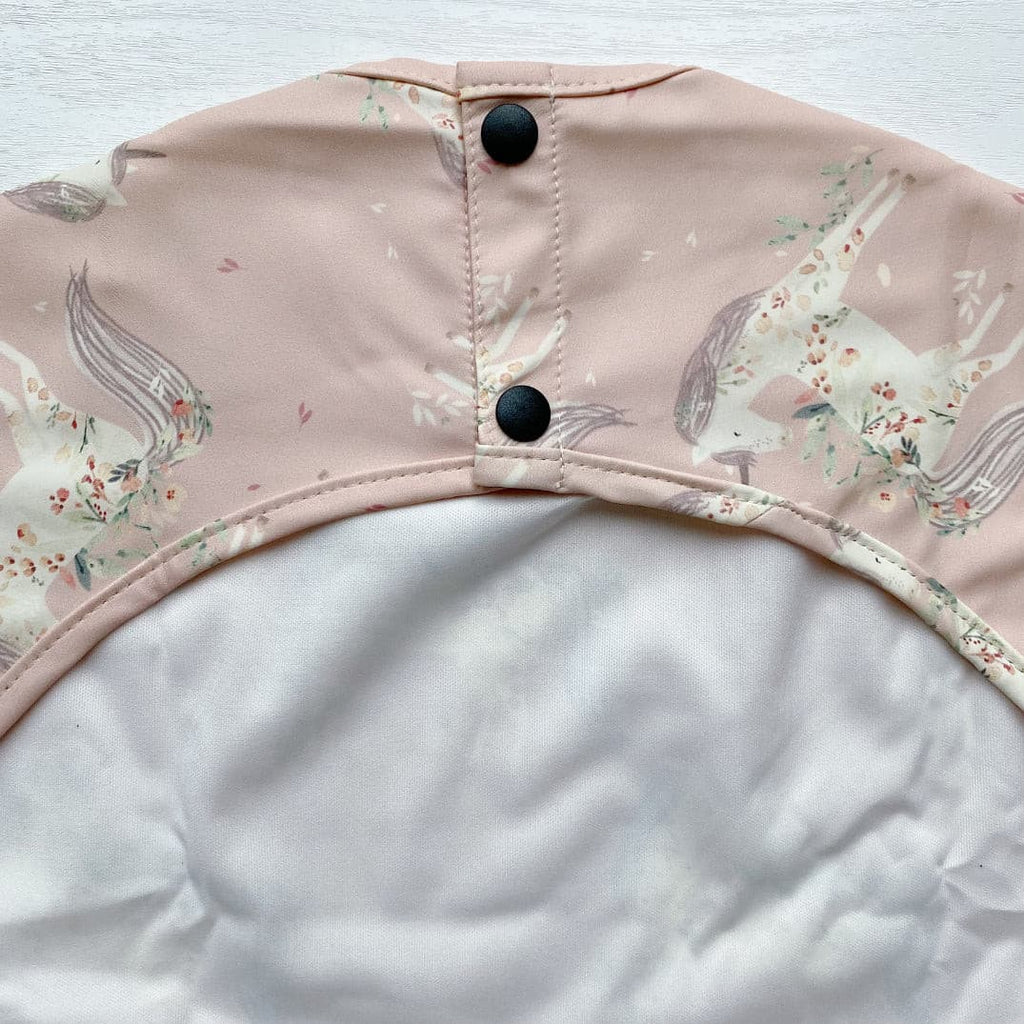 Long Sleeved Baby Bib - Pink Unicorn Print | Bobbin and Bumble.