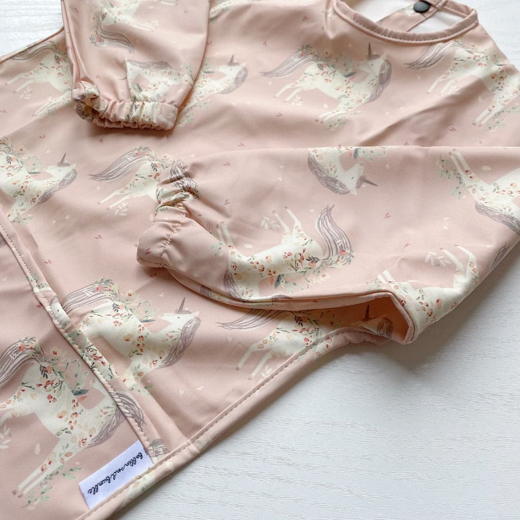 Long Sleeved Baby Bib - Pink Unicorn Print | Bobbin and Bumble.