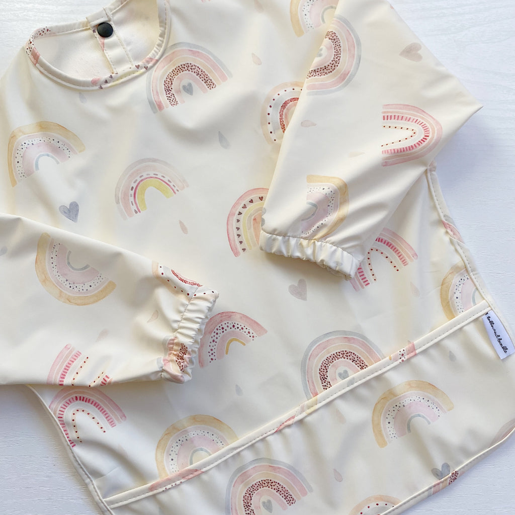 Long Sleeved Baby Bib - Rainbow print | Bobbin and Bumble.