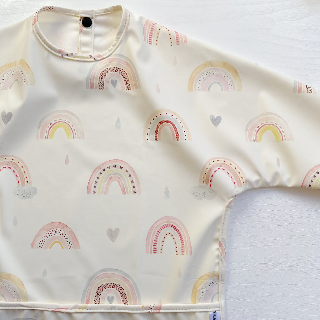 Long Sleeved Baby Bib - Rainbow print | Bobbin and Bumble.