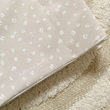 Anti-Roll Wedge Baby Changing Mat - Sand Animal Print | Bobbin and Bumble.